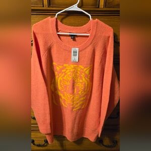 Orange Sweater with Yellow Design